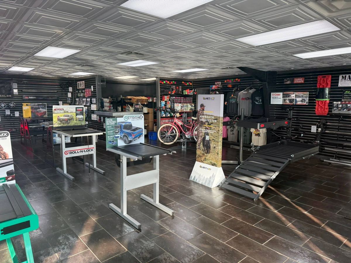 Fayetteville Automotive accessories showroom with bed covers, hitches and truck accessories